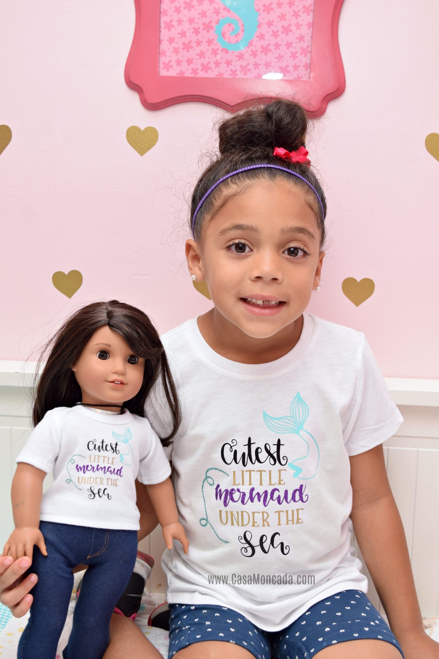 little girl and doll matching clothes